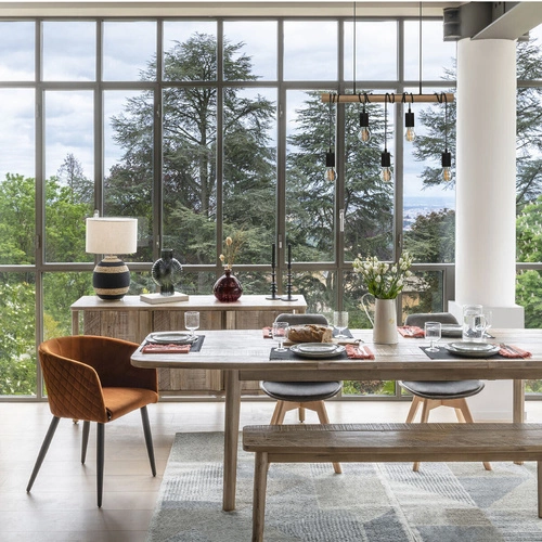 Krzesło tapicerowane welur Marlo Atmosphera miedziane z podłokietnikami do jadalni nowoczesne