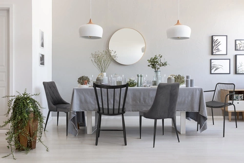 Krzesło Magnat tapicerowane welur szary glamour na czarnych metalowych nogach do jadalni Intesi