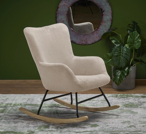 Fotel uszak bujany Donelia na biegunach do salonu kremowy sztruksowy boho z podłokietnikami