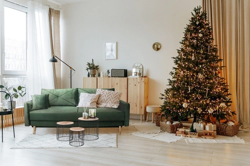 Sofa rozkładana z funkcją spania Saxo zielona 2 osobowa do salonu z pojemnikiem na pościel