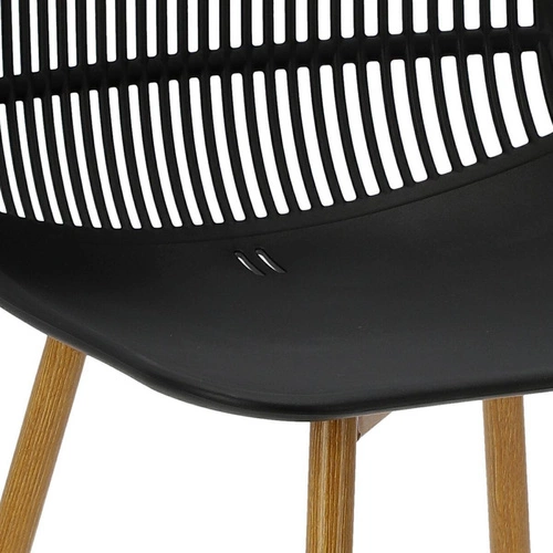 Krzesło do jadalni i kuchni Klaus Simplet czarne ażurowe z tworzywa na metalowych nogach